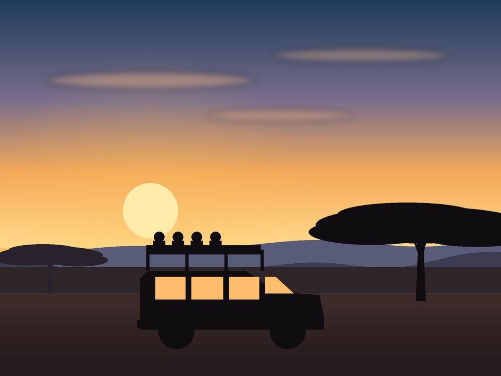 Safari vehicle on a game drive at sunset